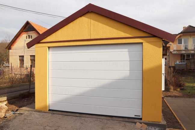 Eine montierte Satteldach-Garage in dunkel-gelb