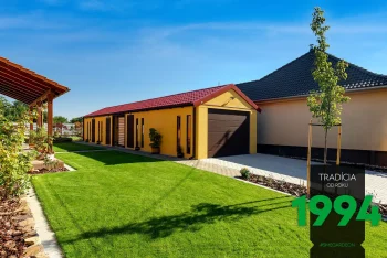 Gelbe Garage mit Satteldach und Überdachung GARDEON